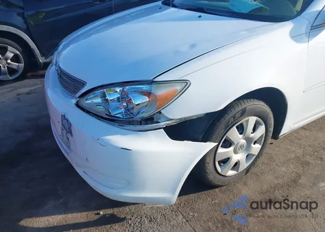 2002 Toyota Camry Le from USA, damaged, VIN 4T1BE32K42U083367